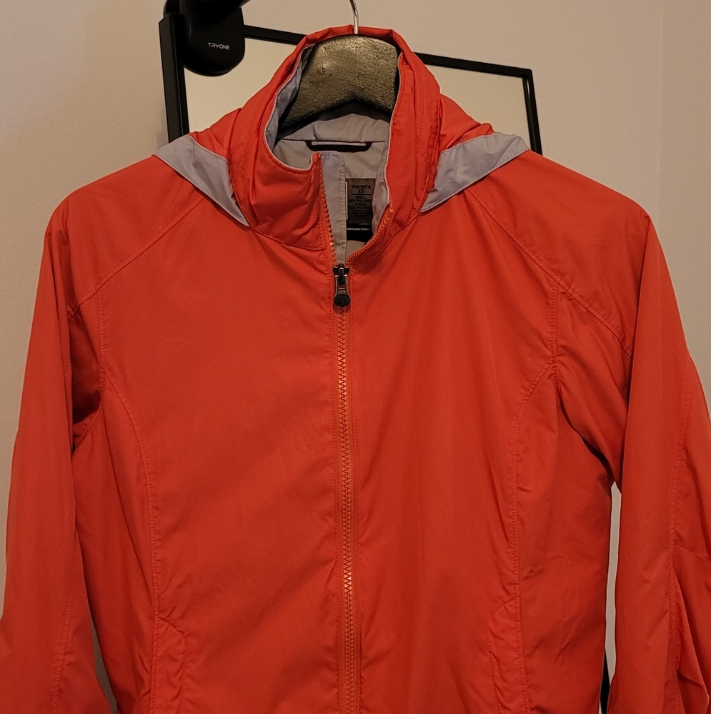 REI Womens xs orange windbreaker jacket, like new